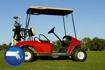 a red golf cart and golf clubs on a golf course - with Massachusetts icon