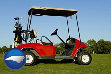 a red golf cart and golf clubs on a golf course - with North Carolina icon