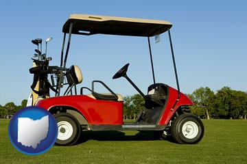 a red golf cart and golf clubs on a golf course - with Ohio icon
