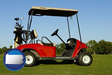 a red golf cart and golf clubs on a golf course - with Pennsylvania icon