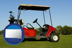 south-dakota map icon and a red golf cart and golf clubs on a golf course